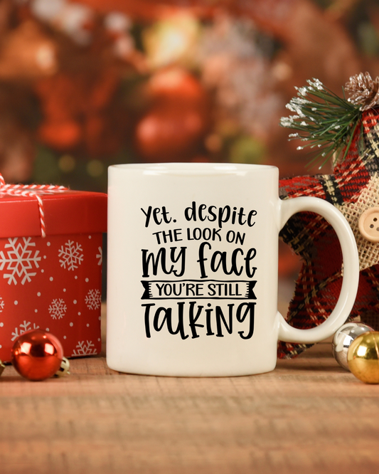 And Yet, Despite This Look On My Face You Are Still Talking | Coffee Mug or Travel Mug